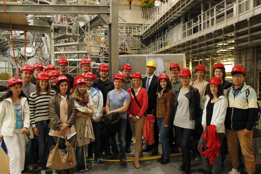 <p>Members of the PCF and MSD research groups together with Prof. Dr. Thomas Klinger (yellow helmet), Scientific Director of the stellarator project Wendelstein 7-X at Max Planck Institute for Plasma Physics in Greifswald, who introduced this huge machinery to us.</p>