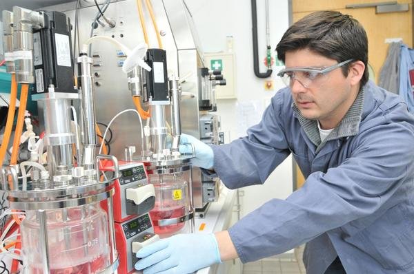 Continuous Production of Cell Culture-derived Vaccines in Cascades of Stirred Tank Bioreactors Continuous Production of Cell Culture-derived Vaccines in Cascades of Stirred Tank Bioreactors