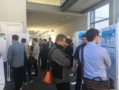 YCOPE 2019 participants discuss during a busy poster session at the Max Planck Institute in Magdeburg.